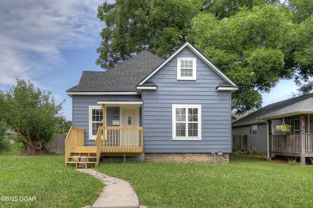 1908 S Picher, Joplin, MO 64804 - view of front facade with a deck and roof with shingles