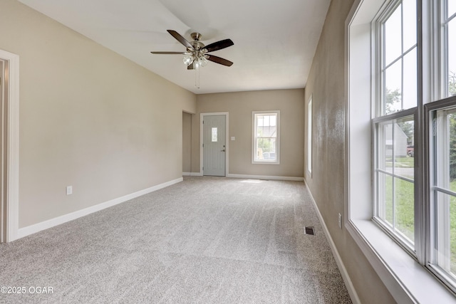 1908 S Picher, Joplin, MO 64804 - empty room with ceiling fan and carpet floors