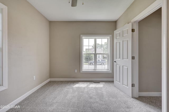 1908 S Picher, Joplin, MO 64804 - unfurnished bedroom featuring carpet flooring and ceiling fan