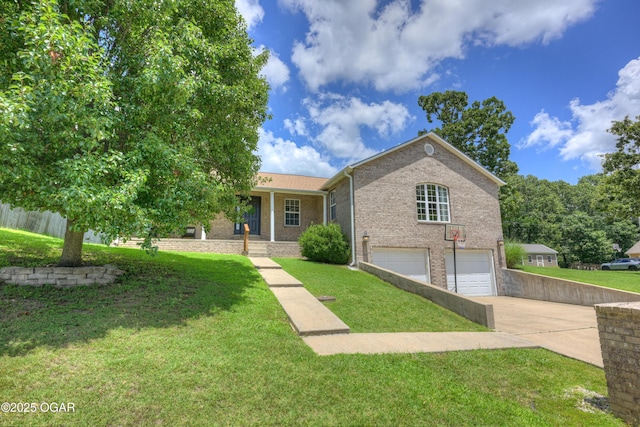 121 Fawn Trl, Seneca, MO 64865 - view of front of property with concrete driveway, an attached garage, a front lawn, and brick siding