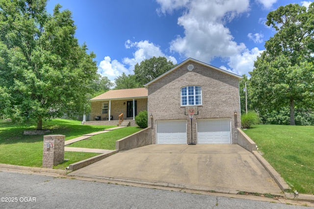 121 Fawn Trl, Seneca, MO 64865 - view of front of property with a front yard, an attached garage, brick siding, and driveway