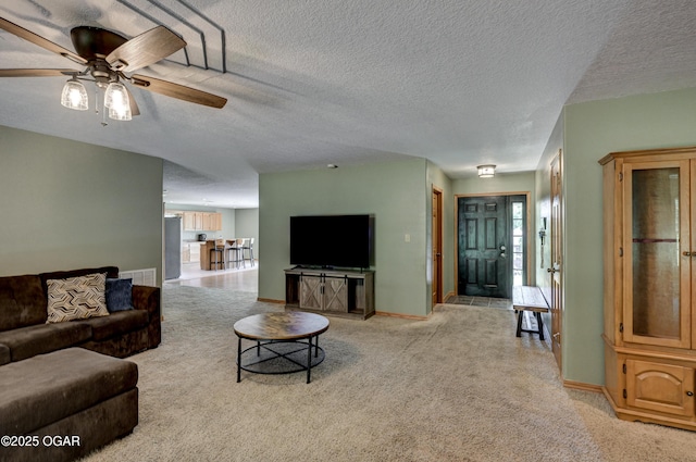 121 Fawn Trl, Seneca, MO 64865 - living area featuring light carpet, ceiling fan, and a textured ceiling