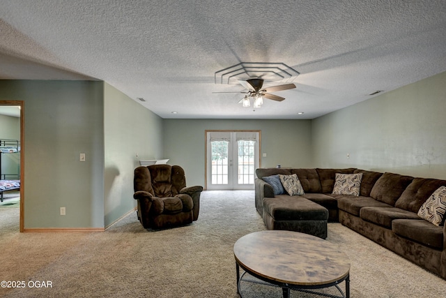 121 Fawn Trl, Seneca, MO 64865 - carpeted living area with ceiling fan, french doors, and a textured ceiling