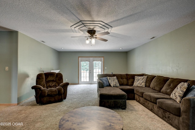 121 Fawn Trl, Seneca, MO 64865 - carpeted living room featuring ceiling fan, french doors, and a textured ceiling