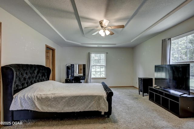 121 Fawn Trl, Seneca, MO 64865 - carpeted bedroom featuring a raised ceiling, a ceiling fan, and a textured ceiling