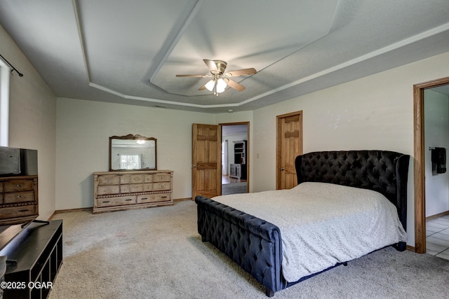 121 Fawn Trl, Seneca, MO 64865 - bedroom with a raised ceiling, light carpet, and ceiling fan
