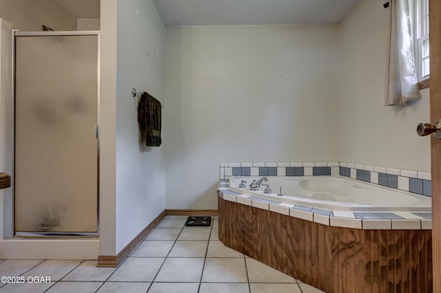121 Fawn Trl, Seneca, MO 64865 - full bath featuring a shower stall, a garden tub, and tile patterned flooring