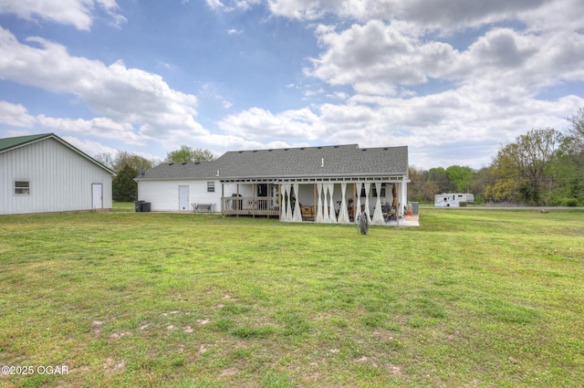 23841 Jaguar Rd, Oronogo, MO 64855 - back of property with a lawn and a patio area