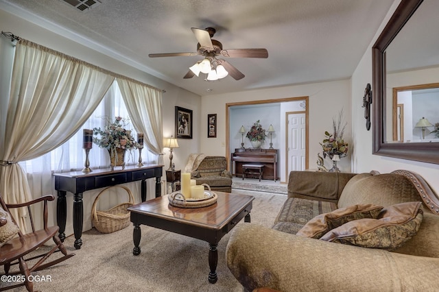 23841 Jaguar Rd, Oronogo, MO 64855 - living room with a ceiling fan, carpet, and a textured ceiling