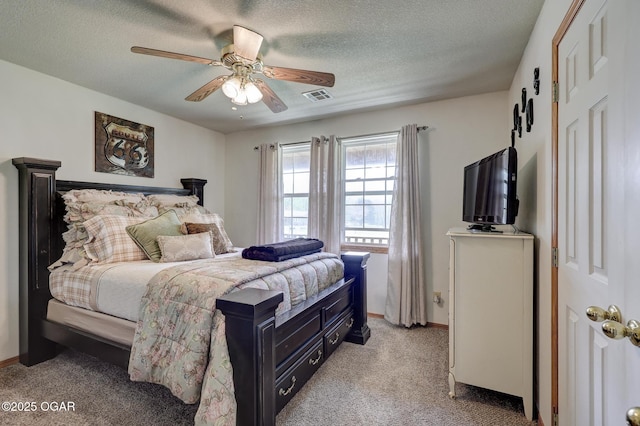 23841 Jaguar Rd, Oronogo, MO 64855 - bedroom featuring light colored carpet, a textured ceiling, and a ceiling fan