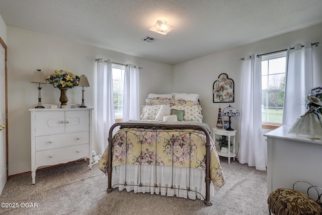 23841 Jaguar Rd, Oronogo, MO 64855 - bedroom with light carpet and a textured ceiling