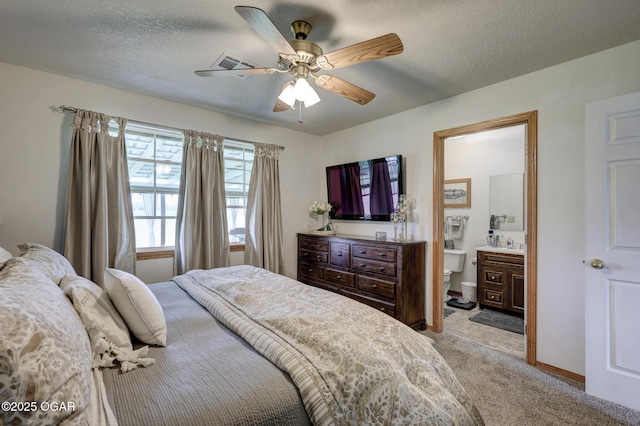 23841 Jaguar Rd, Oronogo, MO 64855 - bedroom with light carpet, a textured ceiling, a ceiling fan, and ensuite bathroom