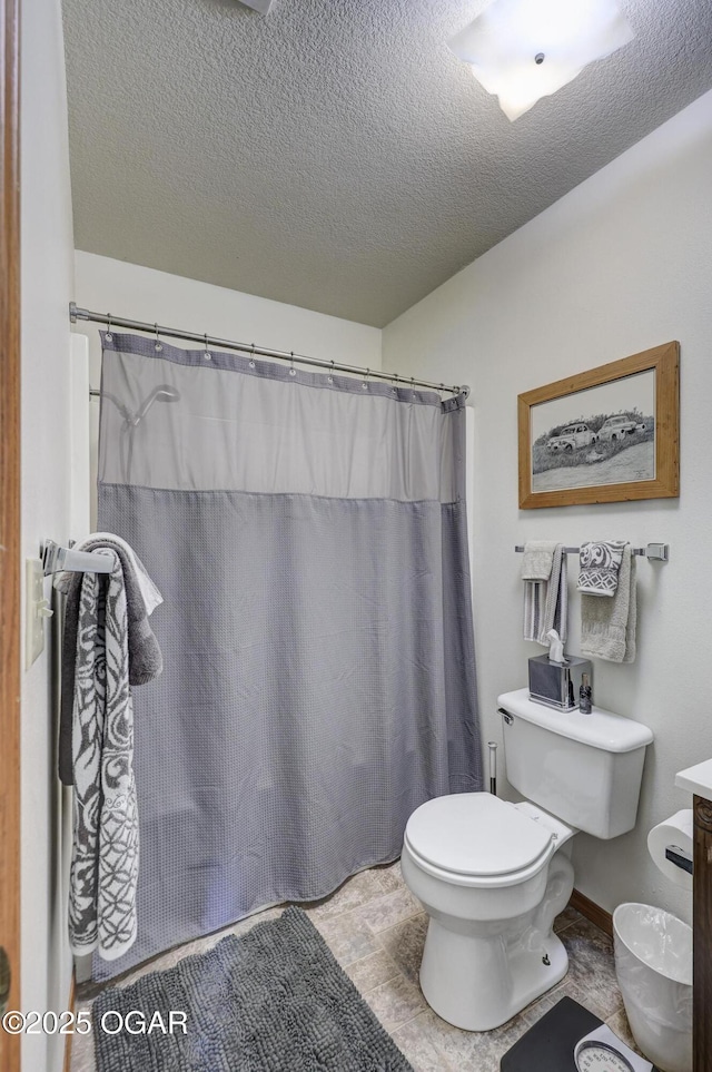 23841 Jaguar Rd, Oronogo, MO 64855 - full bathroom featuring a textured ceiling, curtained shower, vanity, and tile patterned floors