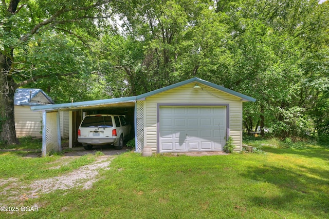 712 Joplin St, Sarcoxie, MO 64862 - garage featuring a garage and driveway