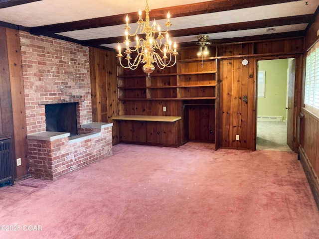 25399 Demott Dr, Joplin, MO 64801 - unfurnished living room featuring wooden walls, beam ceiling, carpet floors, a baseboard radiator, and a brick fireplace