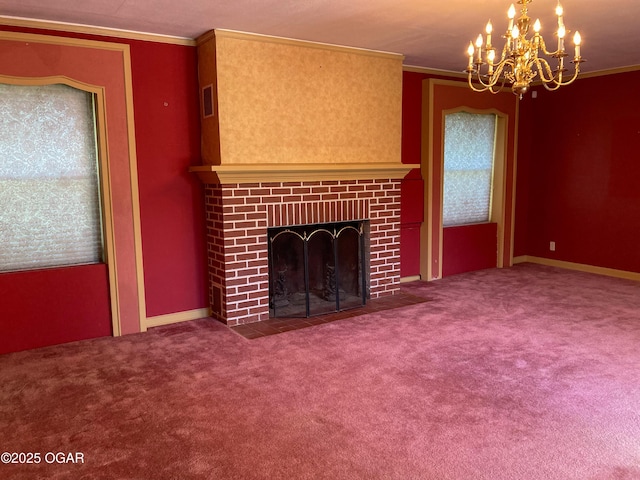 25399 Demott Dr, Joplin, MO 64801 - unfurnished living room with a chandelier, carpet flooring, ornamental molding, and a brick fireplace