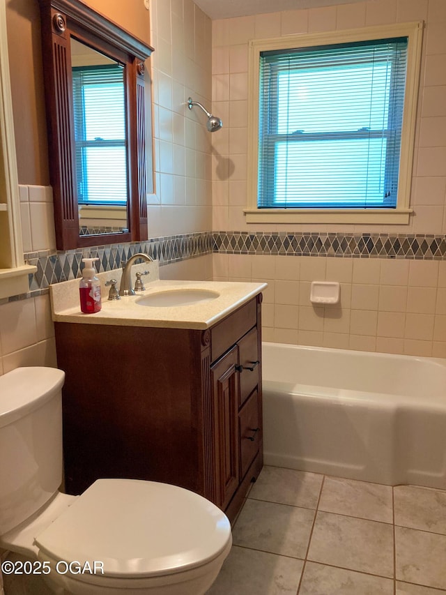 25399 Demott Dr, Joplin, MO 64801 - bathroom featuring tile walls, tile patterned flooring, and vanity