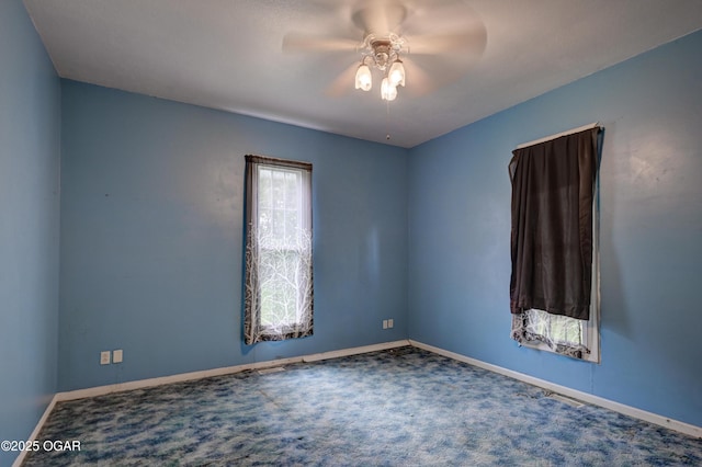 302 E Market St, Diamond, MO 64840 - empty room featuring a ceiling fan and carpet