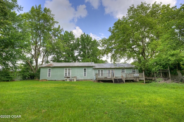 302 E Market St, Diamond, MO 64840 - back of house with a wooden deck and a yard