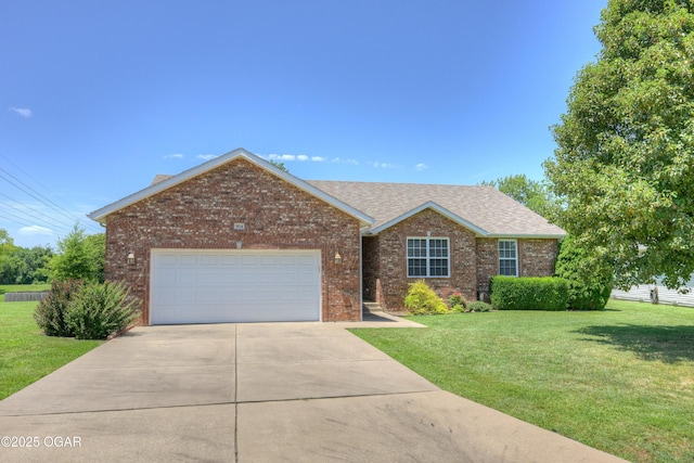 3024 N Chandler Ave, Joplin, MO 64801 - ranch-style house with a garage, brick siding, driveway, and a front yard