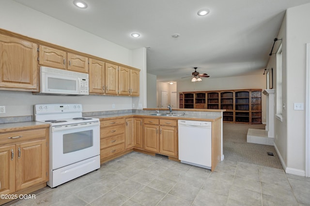 3024 N Chandler Ave, Joplin, MO 64801 - kitchen with white appliances, ceiling fan, light countertops, a peninsula, and recessed lighting