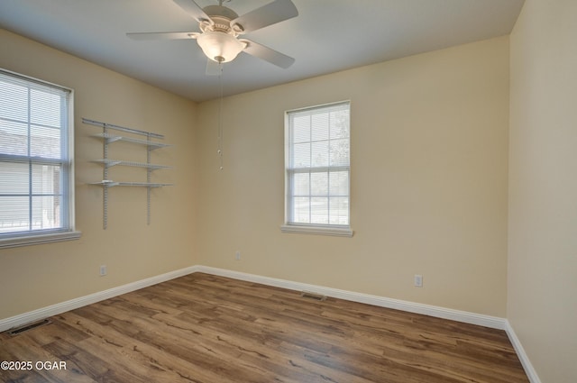 3024 N Chandler Ave, Joplin, MO 64801 - empty room featuring wood finished floors and ceiling fan