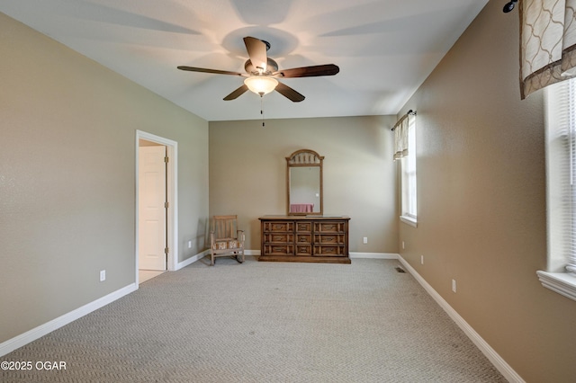 3024 N Chandler Ave, Joplin, MO 64801 - carpeted bedroom featuring baseboards and a ceiling fan