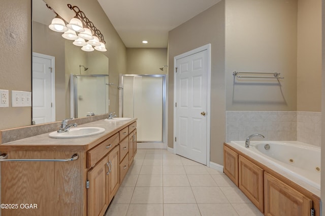 3024 N Chandler Ave, Joplin, MO 64801 - full bath with a stall shower, double vanity, a jetted tub, and tile patterned floors