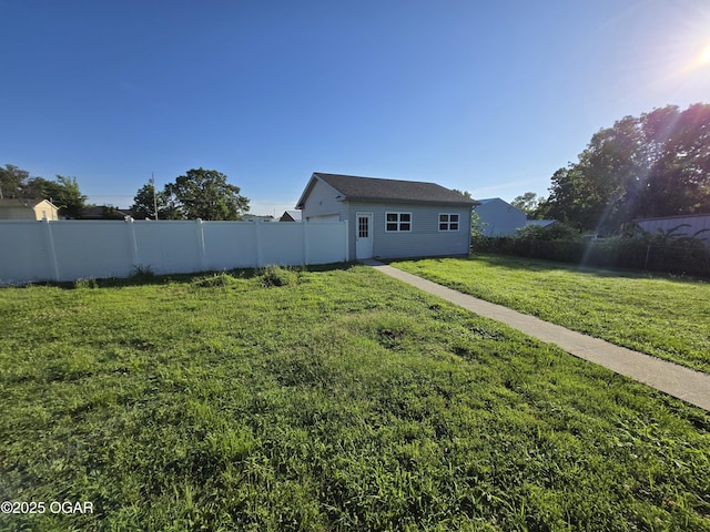 3511 Nola Dr, Joplin, MO 64801 - view of yard featuring a garage and an outbuilding