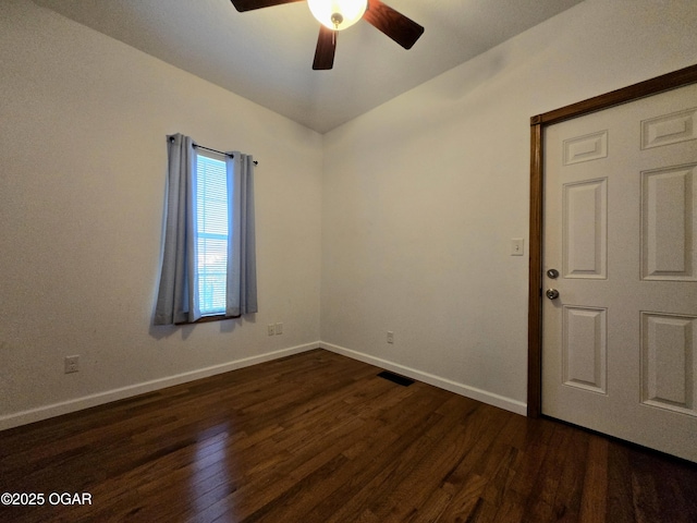 3511 Nola Dr, Joplin, MO 64801 - empty room featuring a ceiling fan and dark wood-type flooring