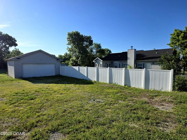 3511 Nola Dr, Joplin, MO 64801 - view of yard with a detached garage