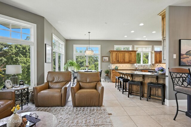 5738 Deer Park Ln, Joplin, MO 64804 - living room featuring light tile patterned floors and recessed lighting
