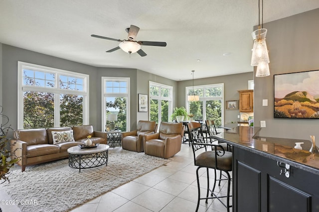 5738 Deer Park Ln, Joplin, MO 64804 - living area with a ceiling fan and light tile patterned floors