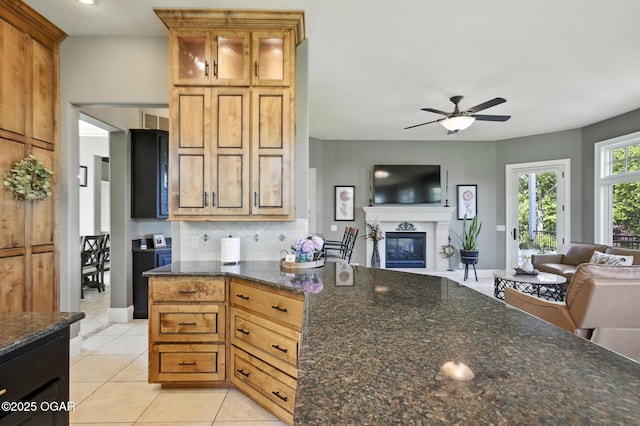5738 Deer Park Ln, Joplin, MO 64804 - kitchen featuring open floor plan, ceiling fan, backsplash, and light tile patterned floors
