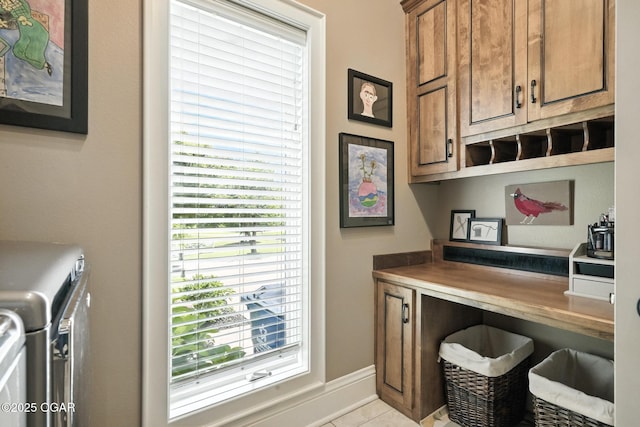 5738 Deer Park Ln, Joplin, MO 64804 - laundry room with separate washer and dryer and cabinet space