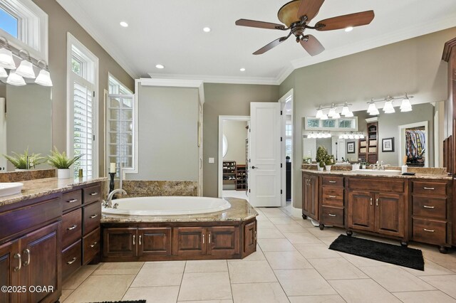 5738 Deer Park Ln, Joplin, MO 64804 - full bathroom featuring crown molding, ceiling fan, vanity, a garden tub, and tile patterned floors