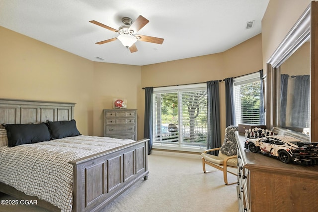 5738 Deer Park Ln, Joplin, MO 64804 - bedroom with light colored carpet and a ceiling fan