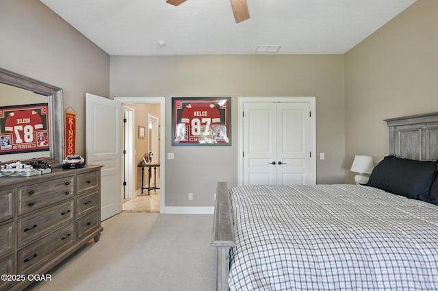 5738 Deer Park Ln, Joplin, MO 64804 - bedroom featuring light carpet, a closet, and a ceiling fan
