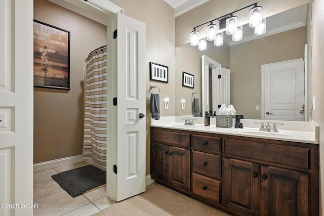 5738 Deer Park Ln, Joplin, MO 64804 - full bath with double vanity, tile patterned flooring, and crown molding