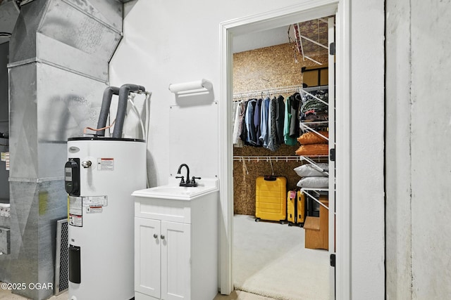 5738 Deer Park Ln, Joplin, MO 64804 - utilities with water heater and a sink