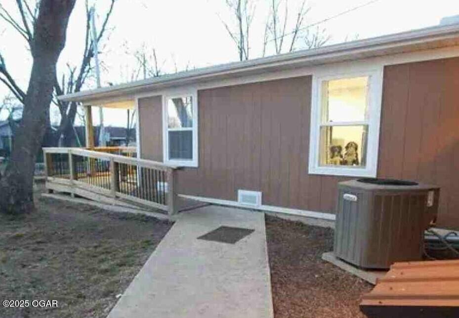 2908 S Park Ave, Joplin, MO 64804 - view of home's exterior featuring a central air condition unit