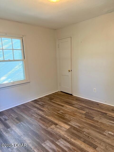1705 S Walnut St, Pittsburg, KS 66762 - empty room featuring dark wood-style floors