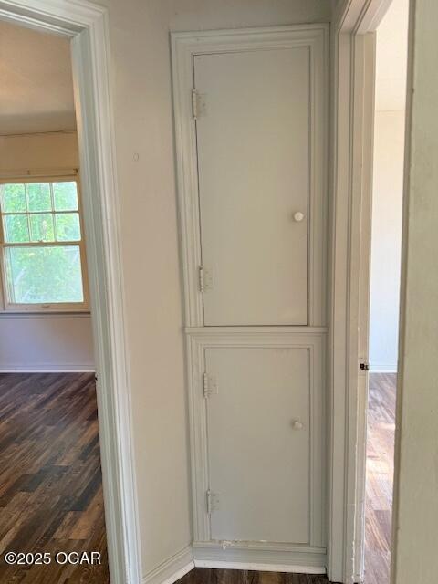 1705 S Walnut St, Pittsburg, KS 66762 - detailed view of wood finished floors and baseboards