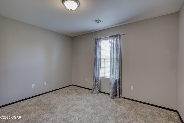 2036 S Ozark, Joplin, MO 64804 - carpeted empty room with baseboards