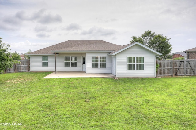 2036 S Ozark, Joplin, MO 64804 - rear view of house with a patio, a fenced backyard, and a shingled roof
