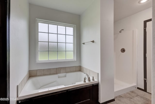 2036 S Ozark, Joplin, MO 64804 - full bathroom featuring a tub with jets and a stall shower