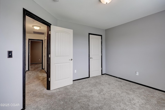 2036 S Ozark, Joplin, MO 64804 - unfurnished bedroom featuring carpet floors