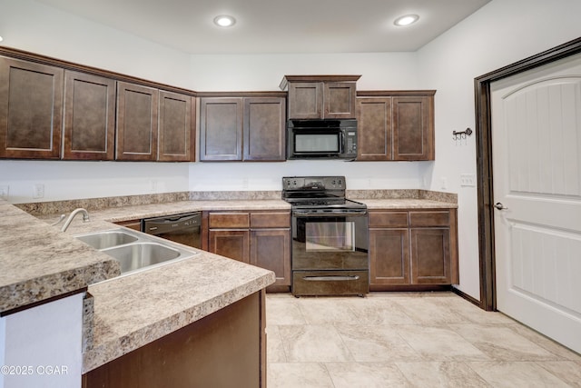 2036 S Ozark, Joplin, MO 64804 - kitchen featuring black appliances, dark brown cabinetry, light countertops, and recessed lighting