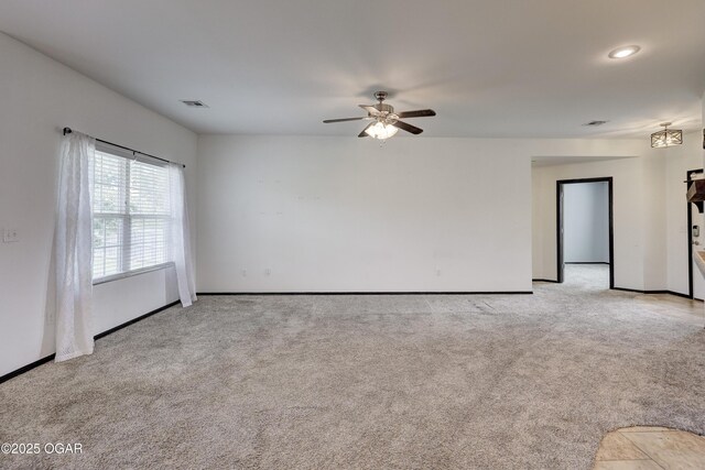 2036 S Ozark, Joplin, MO 64804 - unfurnished room with light colored carpet and ceiling fan