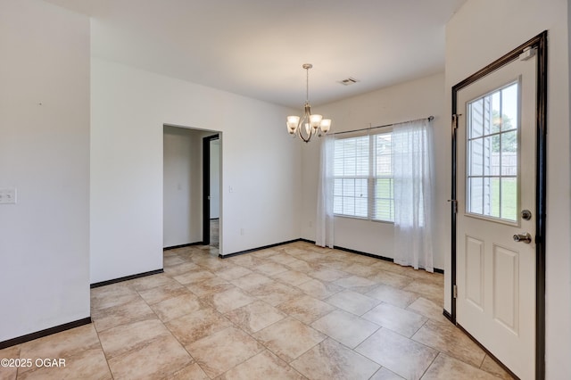 2036 S Ozark, Joplin, MO 64804 - unfurnished dining area featuring a chandelier and baseboards